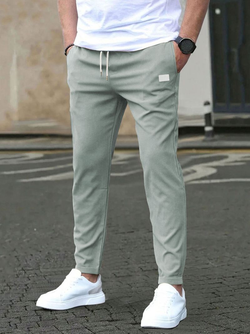 Pantaloni casual slim fit da uomo - Tinta unita, design a nove punti, dettaglio etichetta in pelle, comodi pantaloni con tasche_voghion.com