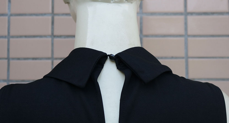 Naisten vaatteet Kevät ja kesä Naisten vaatteet Twist Button V kaula Hihaton Slim Fit haalari ammattikäyttöön_voghion.com