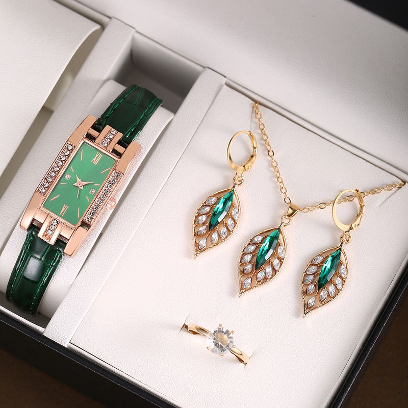 Orologio al quarzo da donna con cinturino in pelle e versatile set di gioielli a forma di foglia - Design minimalista ed elegante con cinturino regolabile_voghion.com