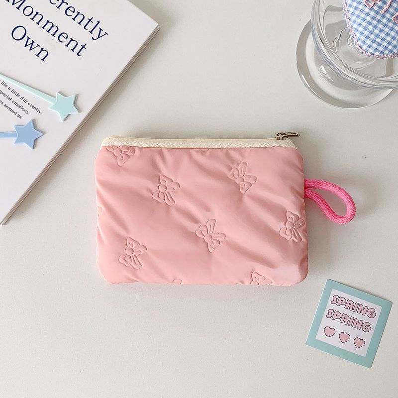 Borsa portamonete piccola portatile con fiocco in argento lucido per trucco, auricolari, cavi dati_voghion.com