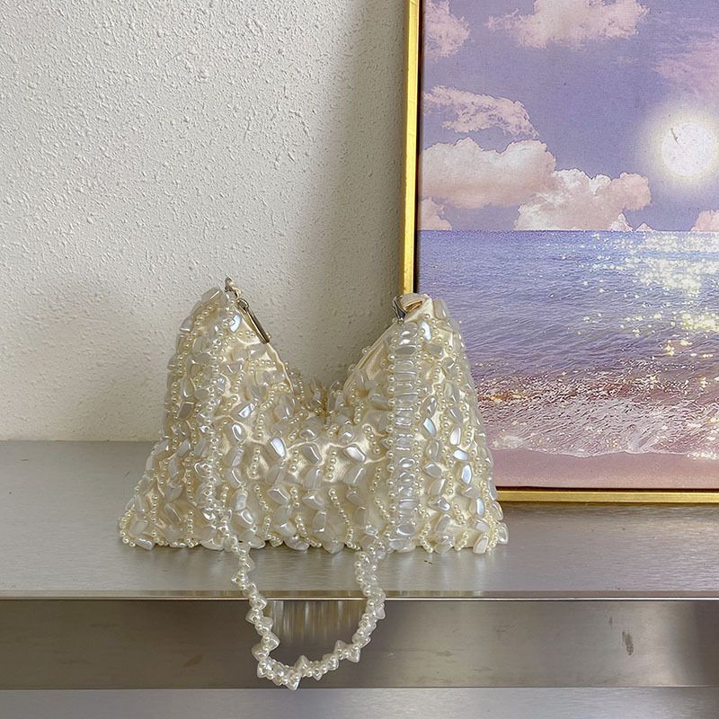 Borsa di lusso leggera con design a nicchia irregolare perlato sotto le ascelle, elegante e dal temperamento francese_voghion.com