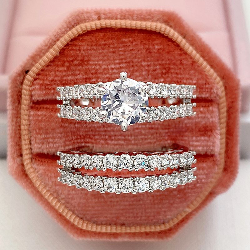 Cao Shis neues ausgehöhltes, doppelschichtiges Zirkon-Verlobungsset für Damen mit Diamant-Hochzeitsbankett, Brautring und Armband_voghion.com