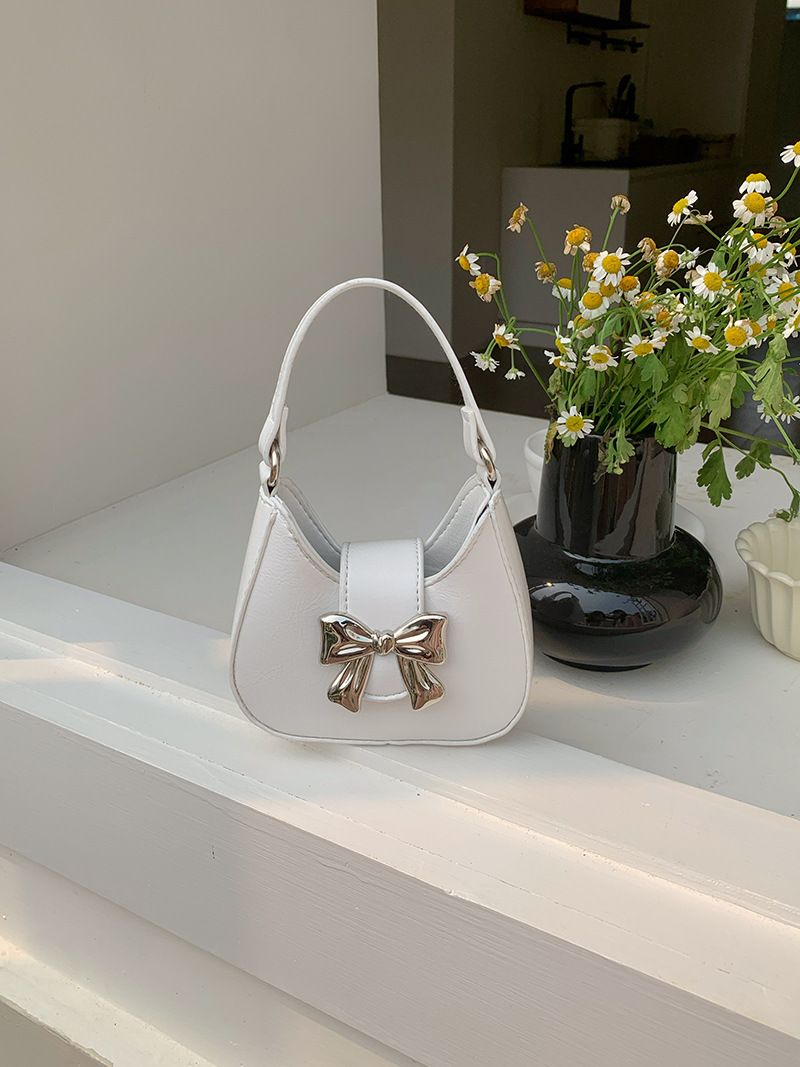 Niche bow handbag new spring/summer trend sweet cool lipstick chain crossbody mini small bag for women_voghion.com