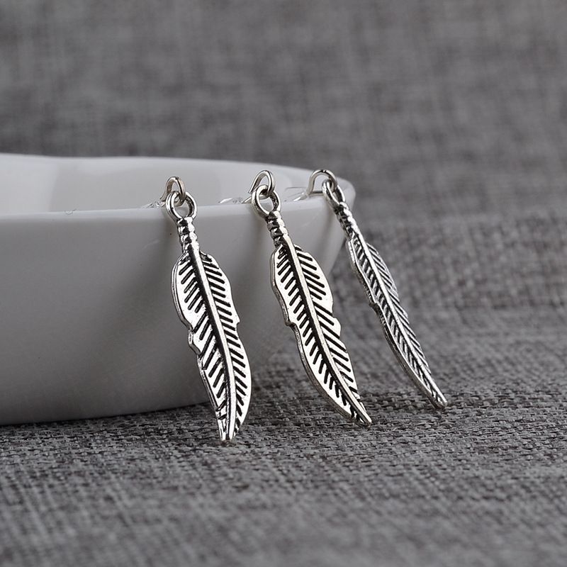Collier chaud de commerce extérieur chaîne de clavicule féminine personnalité de la mode européenne et américaine attrape-rêves pendentif en plumes collier boucle d'oreille accessoires_voghion.com