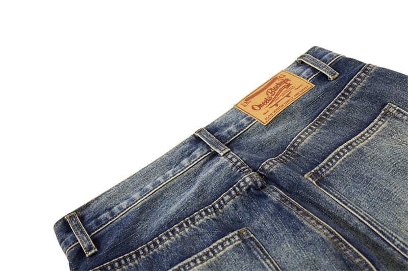 Jeans patchwork streetwear: denim oversize effetto consumato con tasche ricamate e orlo grezzo per un tocco urbano_voghion.com