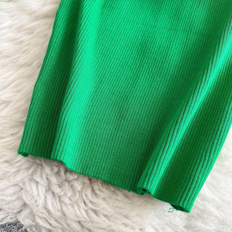 Abito da donna in maglia retrò, senza maniche, con scollo rotondo, vestibilità attillata, monopetto, gonna aderente con cintura sui fianchi, lunghezza media_voghion.com