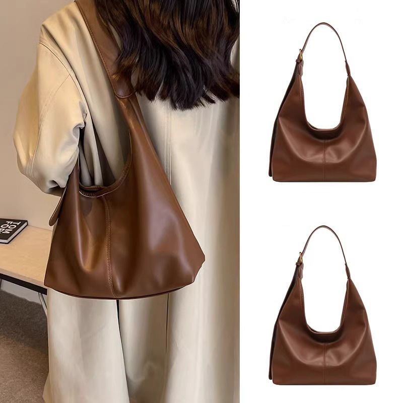 Borse di nicchia per le donne 2025 Nuova borsa tote semplice di alta qualità di colore solido di grande capacità da donna Melad con tracolla singola alla moda_voghion.com