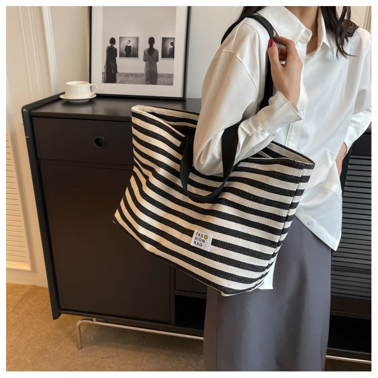 2024 New Spring/summer Popular Simple Shoulder Bag Commuter Handheld Canvas Tote Bag Casual Large Capacity Bag for Women_voghion.com