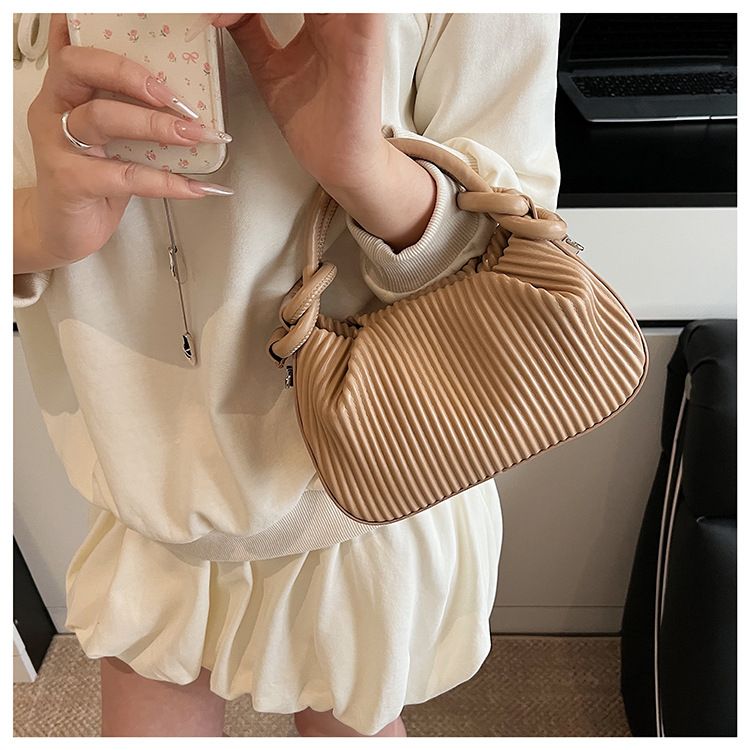 Borsa a mano a righe plissettata con personalità di nicchia per donna, borsa a secchiello versatile alla moda 2025, borsa a tracolla semplice estiva_voghion.com
