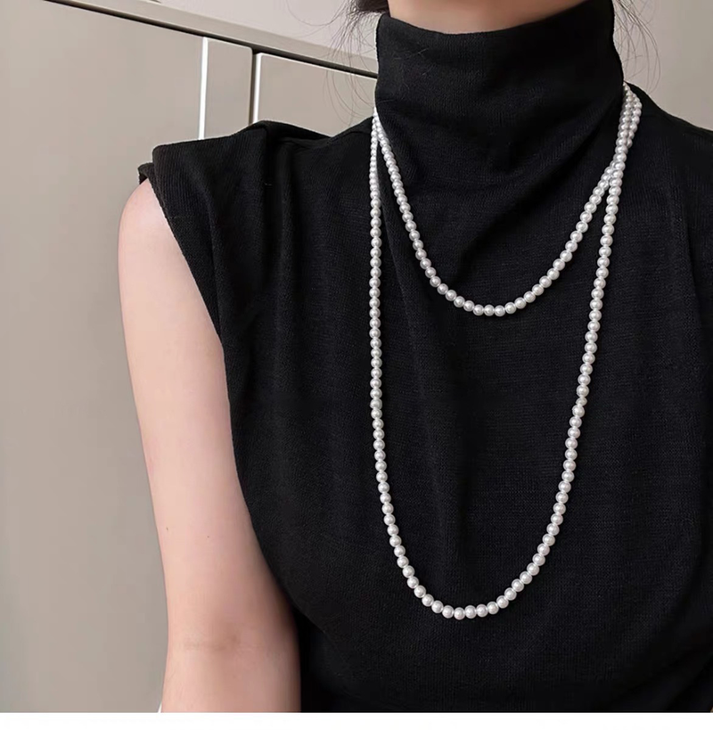 Onregelmatige lange parel Franse lichte elegante trui ketting niche eenvoudige high-end zintuiglijke ketting voor vrouwen_voghion.com