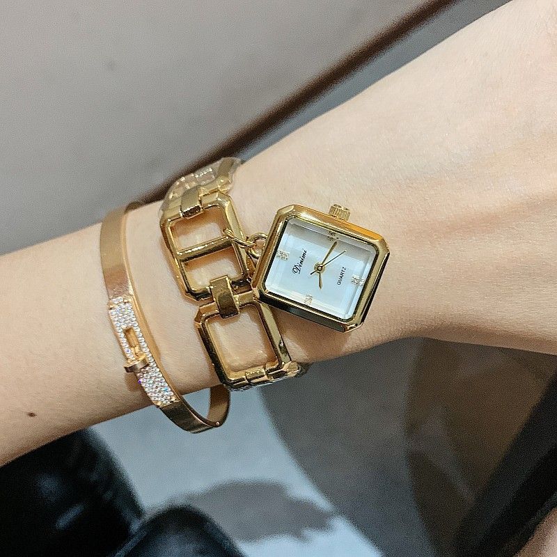 Dimini dinimi orologio da donna quadrato superficie a conchiglia braccialetto cavo orologio da donna piccolo stile profumo orologio pendente_voghion.com