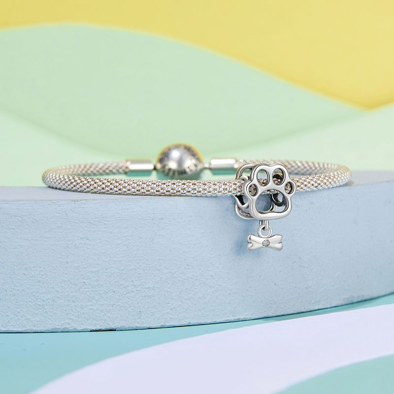 Dije de plata de ley con forma de pata de perro hueca, SCC2955_voghion.com