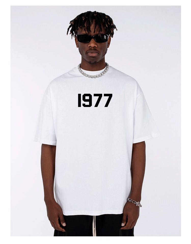 Herrenbekleidung Kurzarm T-Shirt für Männer und Frauen mit kleinem Ausschnitt aus 1977 aus reiner Baumwolle, lockere weiße Fünf-Punkt-Ärmel, überschnittene Schultern, halbe Ärmel_voghion.com