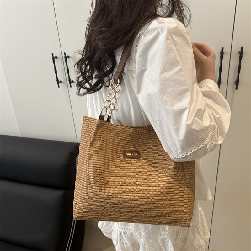 Borsa a tracolla da donna alla moda, nuova e semplice, primavera 2025, casual, con texture di nicchia, da portare sotto le ascelle_voghion.com