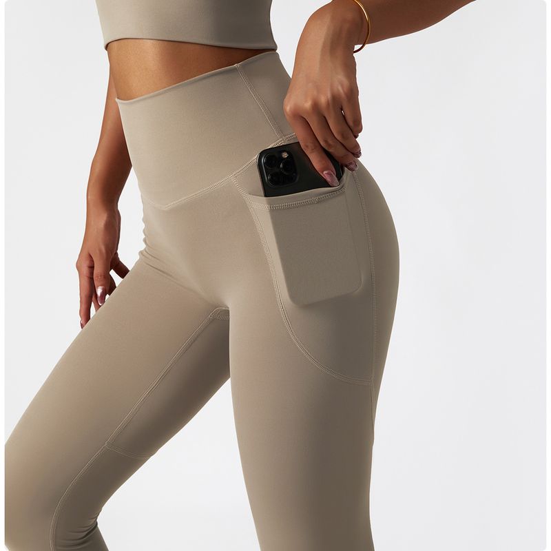 Vêtements pour femmes Pantalon de yoga respirant taille haute pour levage des hanches Portez un pantalon de sport serré avec poche, un pantalon de fitness à séchage rapide_voghion.com