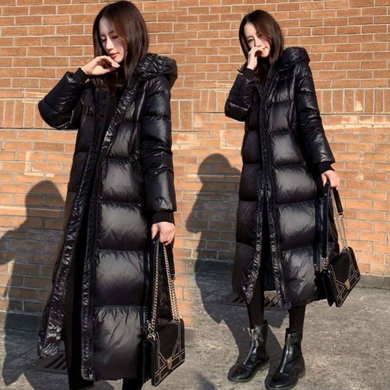 Nuovo piumino nero coreano versione lunga lucida da donna spessa vestibilità slim in cotone alla moda_voghion.com