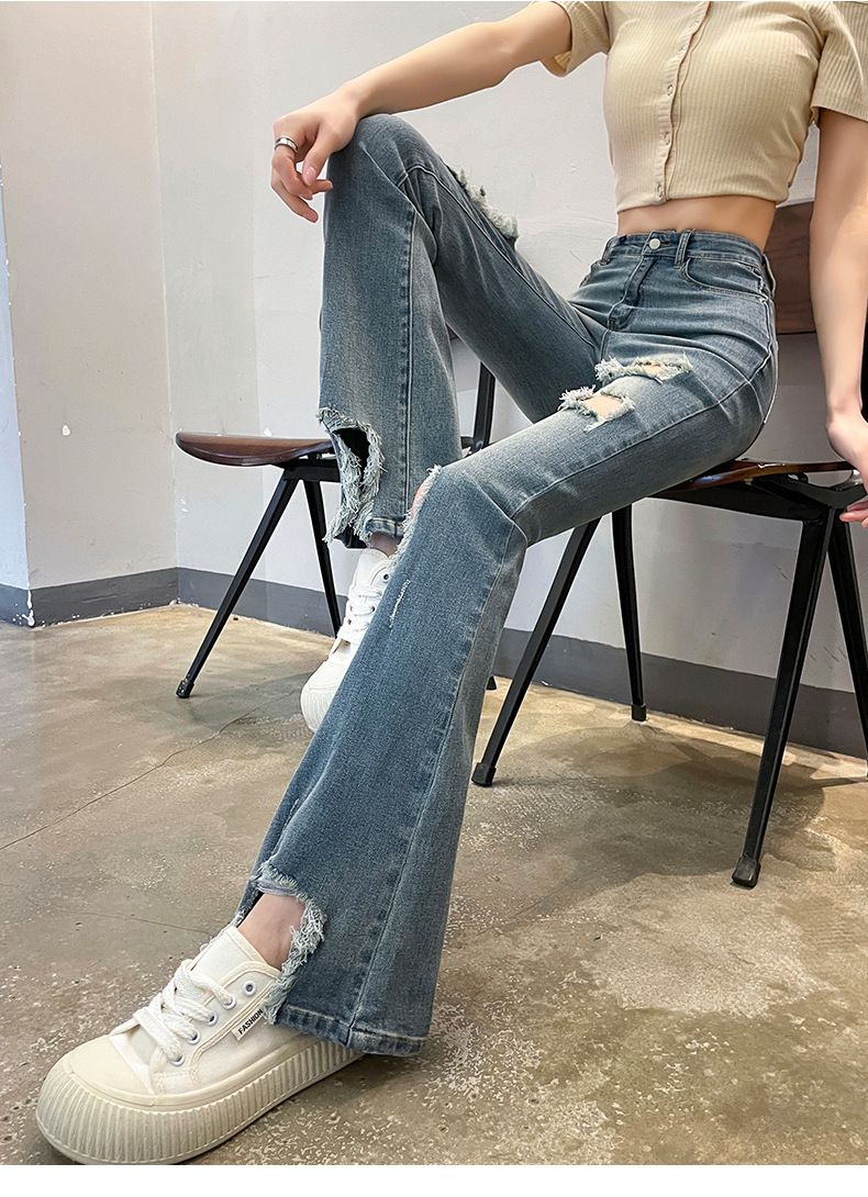 Women's clothing ripped denim bell bottom pants for women spring and summer new elastic small size nine points bell bottom pants trousers_voghion.com
