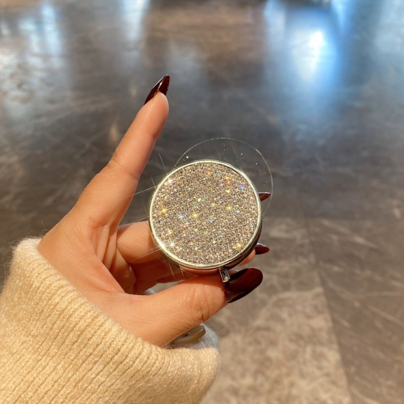 Luxury Diamond-Studded Round Pill Organizer – 7-Compartment Stainless Steel Medicine Case With Mirror Finish, Compact & Travel-Friendly_voghion.com