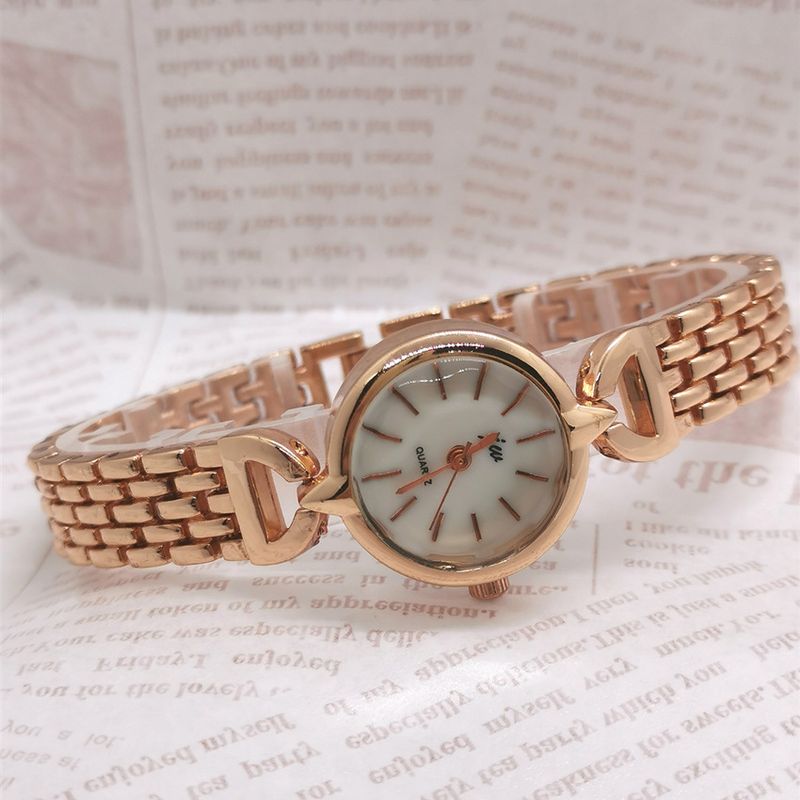Mode Rose Gold Kleine Zifferblatt Quarz frauen Armband Kreuz Spiegel Luxus Dame Uhr_voghion.com
