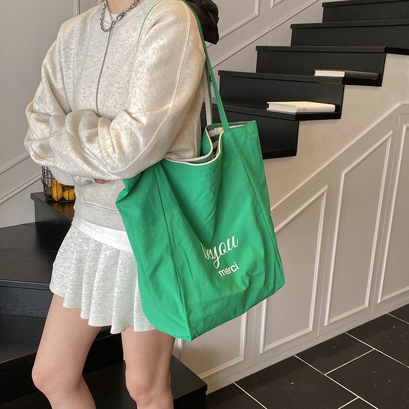 Borse a tracolla da donna: una borsa tote casual a righe con blocchi di colore, dallo stile dolce e rilassato, borsa a tracolla singola bifacciale_voghion.com