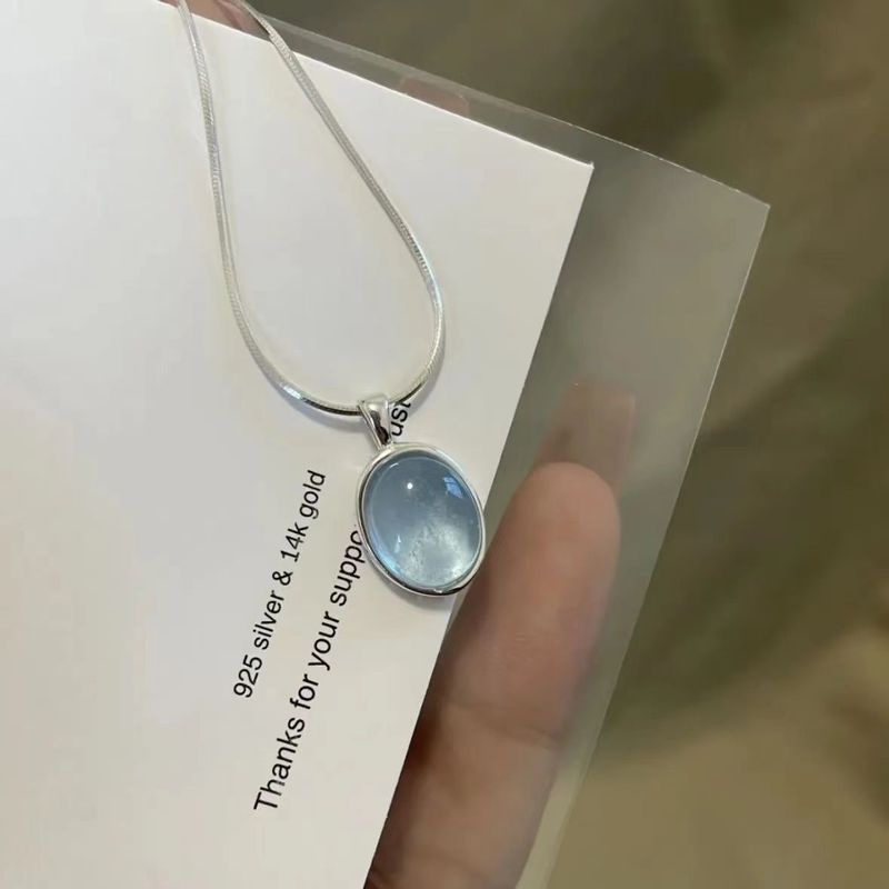 Collana con pietra di luna e acquamarina da donna 2025, nuova catena leggera di lusso con clavicola e catena a forma di serpente e osso, accessori per maglioni_voghion.com