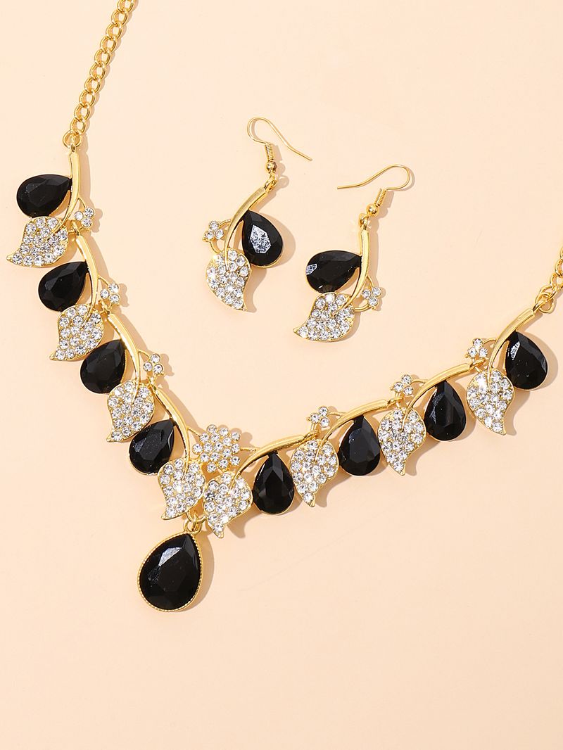 Set di gioielli da donna con collana di cristalli, pochette da sera, elegante design floreale per occasioni formali, versatile set di collana e orecchini di cristalli_voghion.com