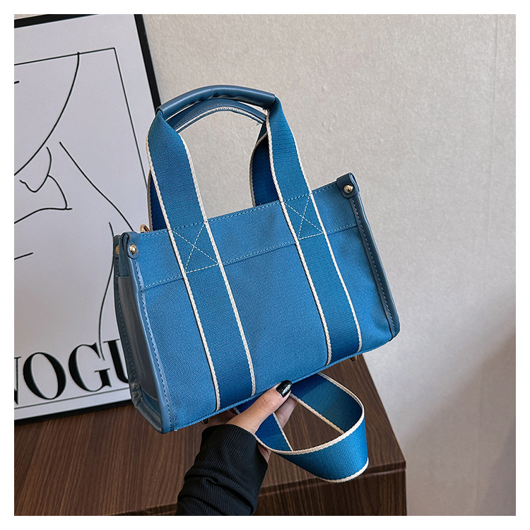 Japan and South Korea Foreign Trade Canvas Bag Women 2023 New Trendy Fashion handbag niche hit color commuting shoulder Messenger bag_voghion.com