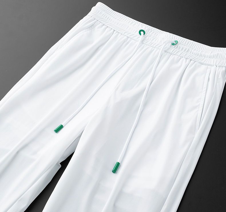 Abbigliamento maschile Pantaloni da uomo in seta ghiacciata bianca con tasche sottili, modello farfalla, estivi, sportivi, casual, vestibilità slim, pantaloni a nove punte da uomo_voghion.com