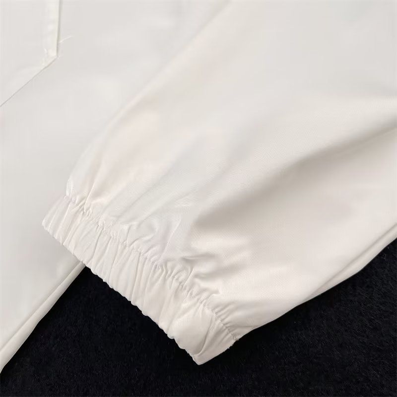 Giacca antivento con cappuccio alla moda da uomo: foderata in pile, impermeabile, vestibilità oversize, design patchwork, stile casual streetwear_voghion.com