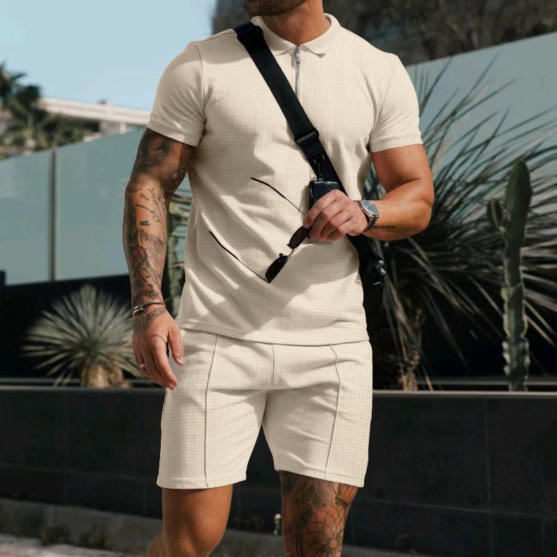 Conjunto de shorts de manga curta masculinos europeus e americanos verão waffle cor sólida casual solto zíper lapela conjunto de duas peças_voghion.com