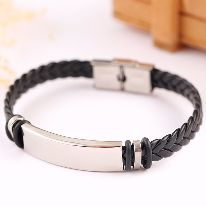 Bracciale da uomo in acciaio inossidabile con incisione in pelle di titanio intrecciata per eventi espositivi_voghion.com