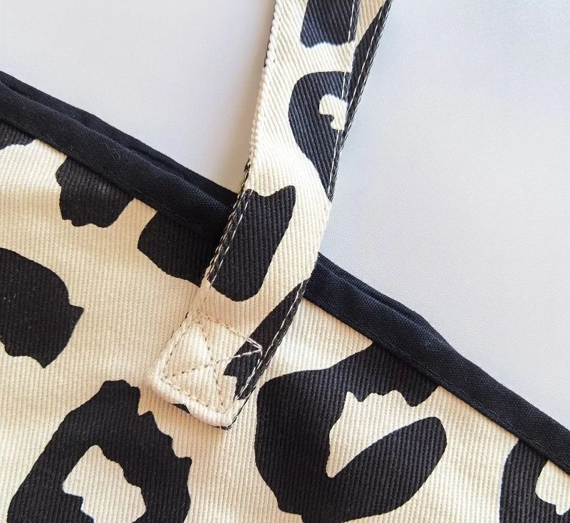 Bolso de lona de diseño moderno para mujer, de alta capacidad, con estampado de vaca y bandolera._voghion.com