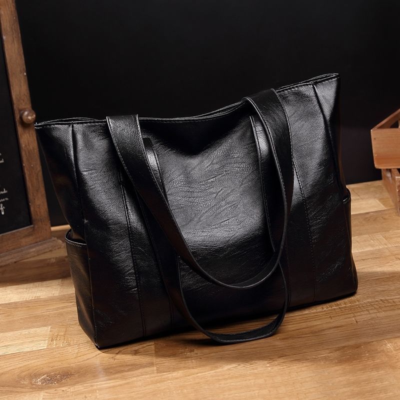 Nuova versione coreana della borsa semplice 2025 Borsa da ufficio in pelle per computer di grande capacità_voghion.com