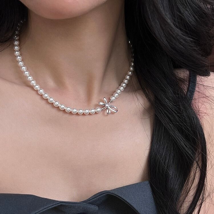 Collana di perle di lusso in argento puro con fiocco in nastro di nicchia, per donna, versatile e di alta qualità, con catena per clavicola._voghion.com