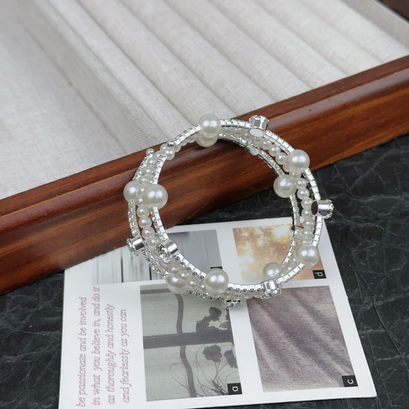Pulsera multicapa con perlas y diamantes de imitación para mujer, diseño único, joyería elegante y moderna._voghion.com