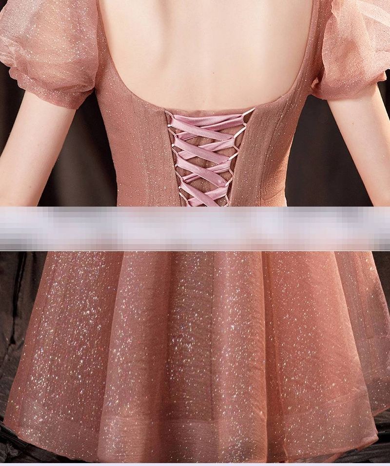 Elegante abito da sera rosa cipria con scollo a V profondo e silhouette da principessa per matrimoni, banchetti e spettacoli_voghion.com