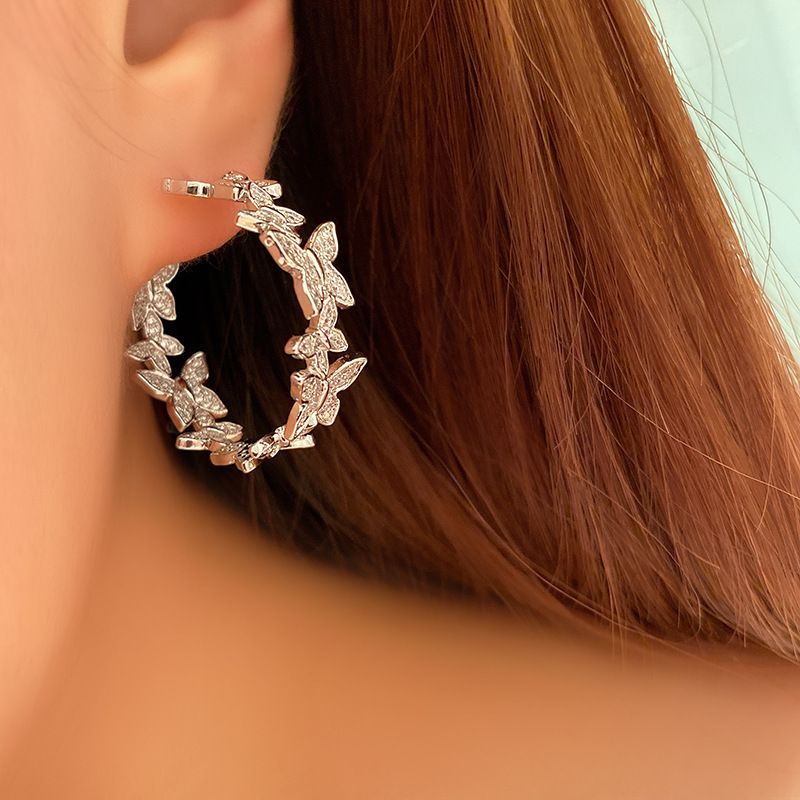 Boucles d'oreilles papillon Cao Shi en diamant pour femmes, élégantes et douces, accessoires de charme européens et coréens_voghion.com