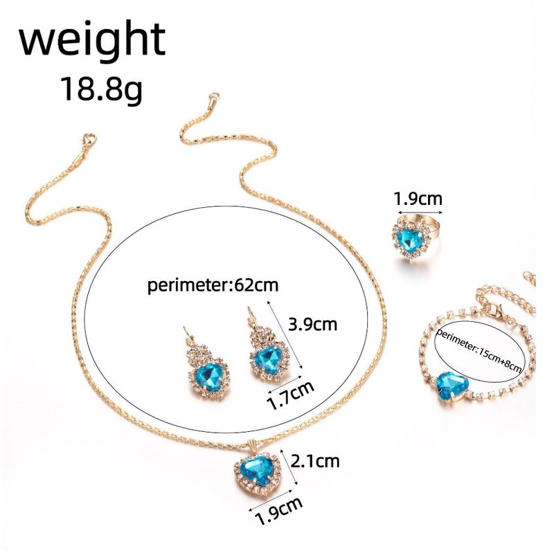 Collana con diamanti, orecchini, anello, bracciale, set di quattro pezzi, gioielli da sposa di alta qualità, borsa da sera, borsa da donna_voghion.com