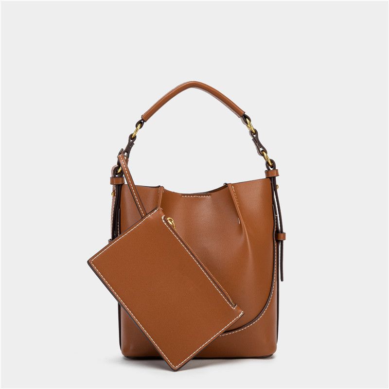 Spain 2025 New Women's Brown Pleated Drawstring Versatile Handbag Bucket Wide Shoulder Strap Crossbody Bag_voghion.com