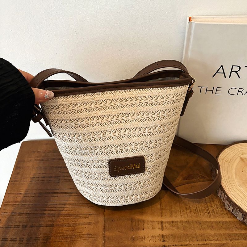 Borsa a secchiello testurizzata per le vacanze estive in spiaggia, carina, stile Mori, da donna, con tracolla singola, casual e intrecciata, nuova moda 2025_voghion.com