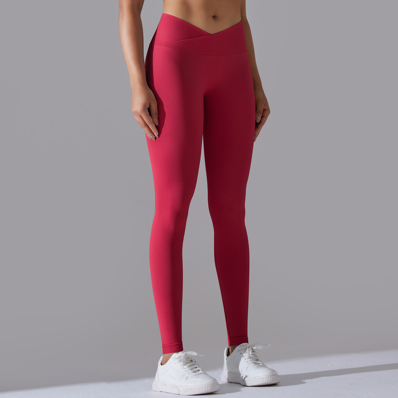 Pantaloni da yoga a nove punti da fitness da donna, lavorati a maglia, traspiranti, in tinta unita, a vita incrociata, color pesca, senza cuciture_voghion.com