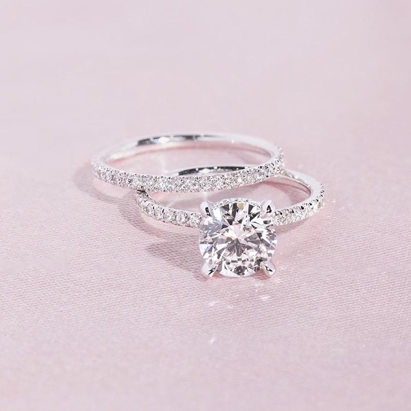 Huitan Bling Zircone cubico rotondo 2 pezzi/set per donna Anelli semplici alla moda impilabili doppi Fedi nuziali Gioielli per feste_voghion.com
