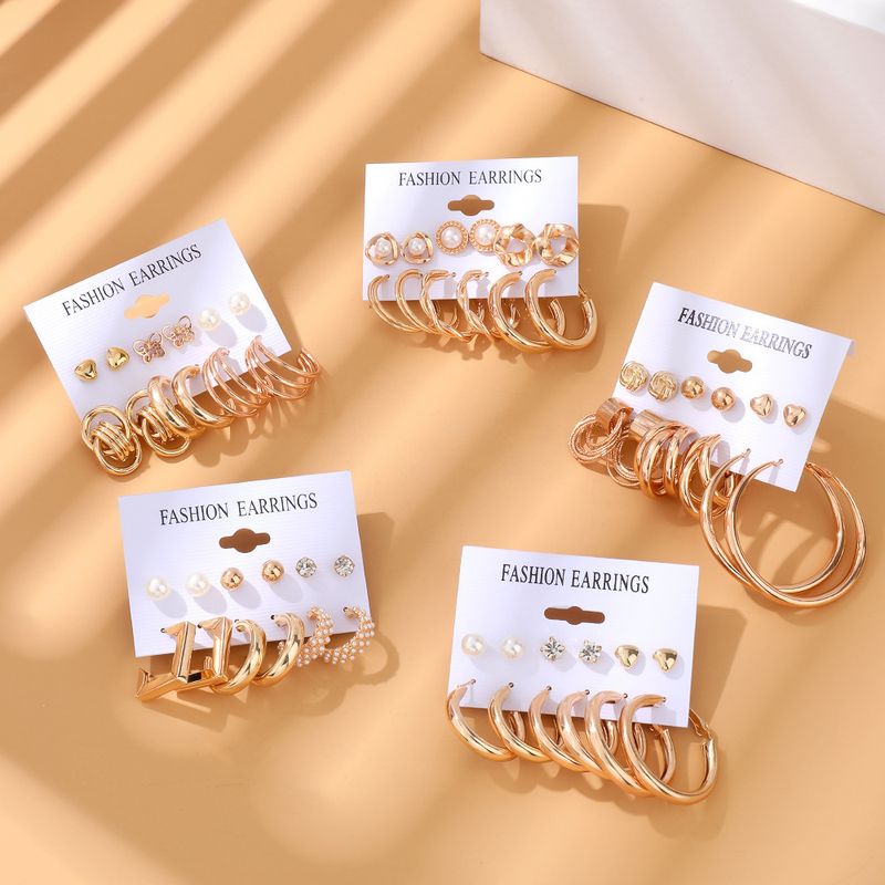 Geometric Circle Pearl Women's Earrings Set Pearl Butterfly Exaggerated Twisted Earrings_voghion.com