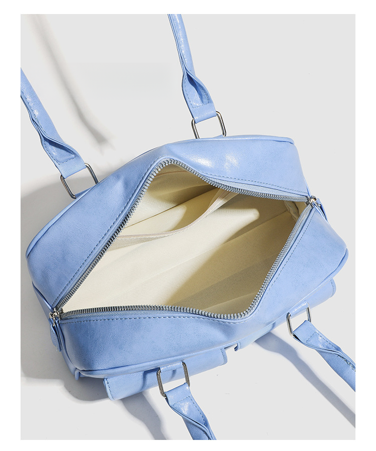 Versione coreana dei modelli estivi Ms. 2025 della nuova borsa a tracolla grande e capiente in pelle cerata con olio sotto le ascelle, alla moda e versatile._voghion.com