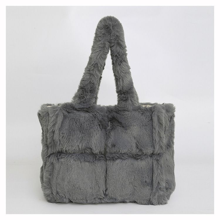 Piccola borsa a mano in pelliccia di nicchia per donna, nuova moda autunno e inverno 2024, borsa a mano in peluche di grande capacità_voghion.com