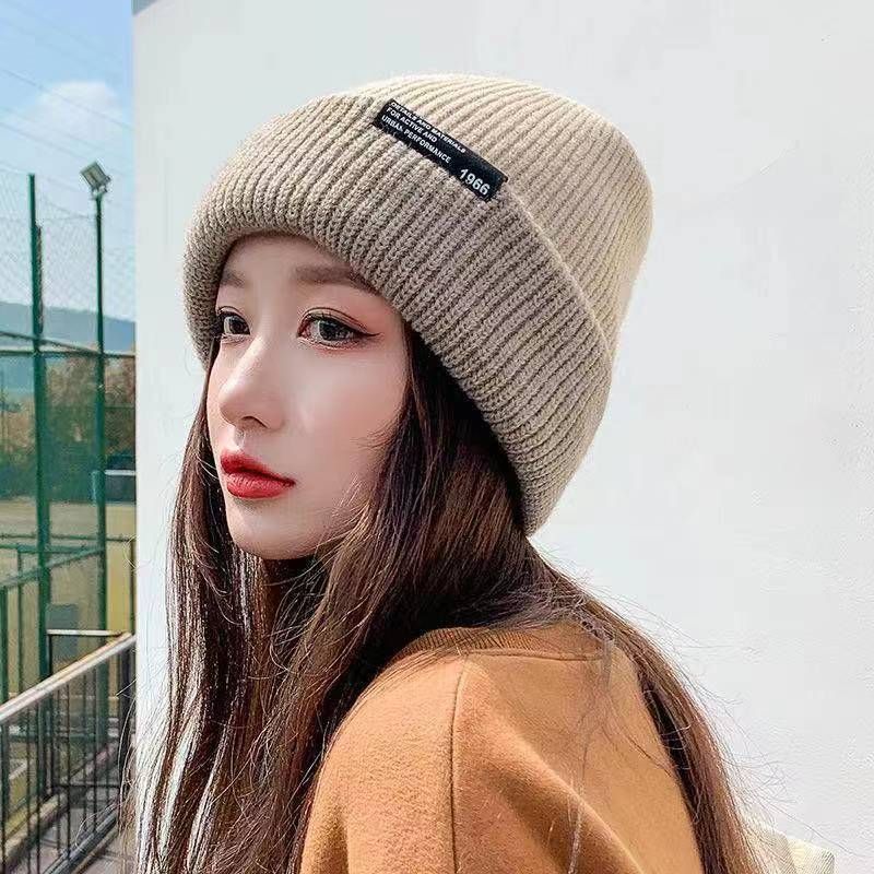Cappello invernale da donna in maglia spessa e calda, versione coreana, protezione per le orecchie, berretto morbido a doppia faccia, all'ingrosso per uomo_voghion.com