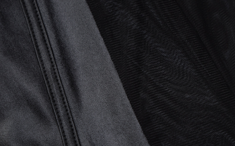 Tuta da donna a maniche lunghe con cerniera posteriore in rete patchwork con collo tondo_voghion.com