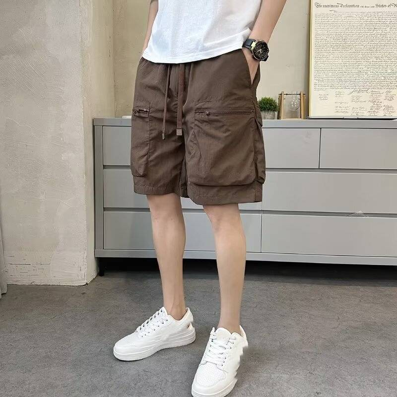 Snel drogende zomerse, dunne, effenkleurige, losse werkbroek met meerdere zakken voor heren, 5-inch casual, trendy merk sportbroek_voghion.com