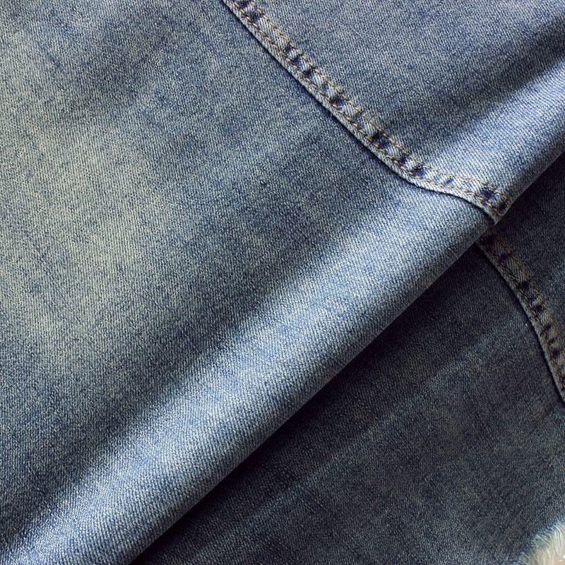 Roupas femininas nova camiseta de manga curta com laço frisado e saia jeans com borda crua dividida_voghion.com