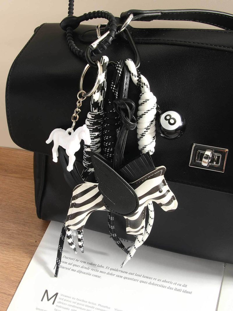 Whimsical Zebra-Print Pony Keychain – Stylish PU Leather Charm With Black Braided Rope (Maximalist Bag Accessory)_voghion.com